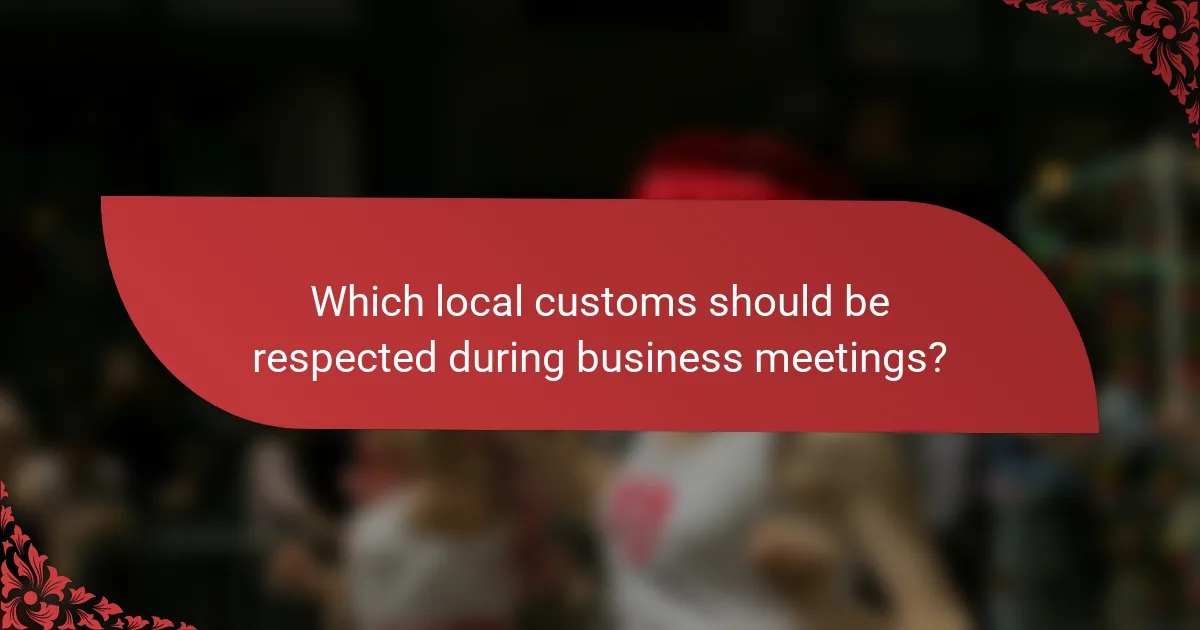 Which local customs should be respected during business meetings?